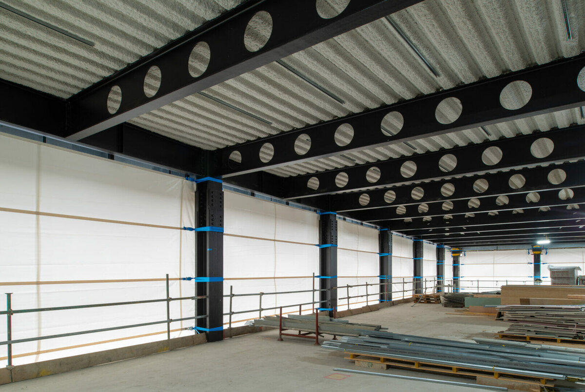 Base Structures install temporary weather screening to adapt to fast-moving building project