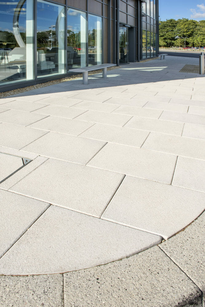 TEXTURED LUGANO PAVING FROM BRETT LANDSCAPING GIVES PREMIUM IMAGE TO HOTEL