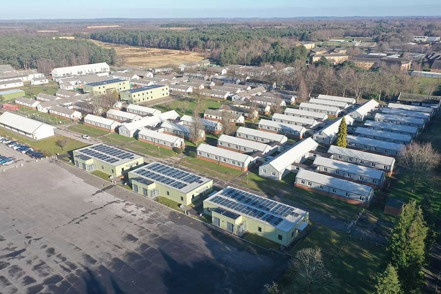 Harwood join DIO, Landmarc Support Services (Landmarc) and Reds10 to provide new accommodation blocks at Surrey training camp as part of NetCAP initiative for the MOD
