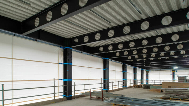 Base Structures install temporary weather screening to adapt to fast-moving building project