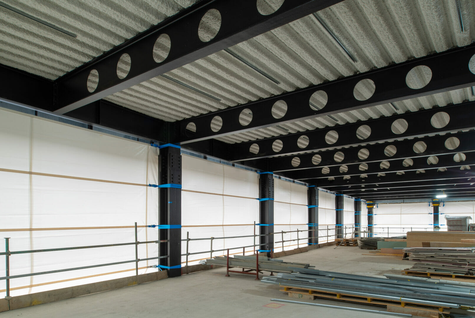 Base Structures install temporary weather screening to adapt to fast-moving building project